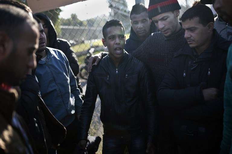 Des migrants algériens et marocains en décembre 2013.