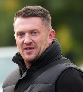 Tommy Robinson charged with terror offence after failing to provide phone password