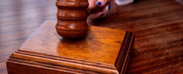 judge s gavel in courtroom setting