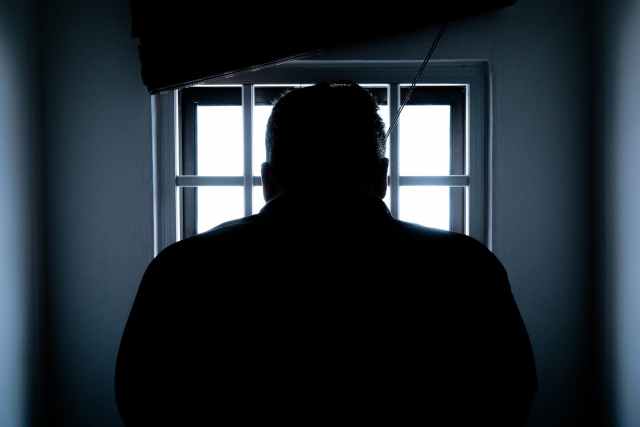 Illustration d'un détenu en prison